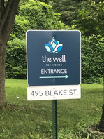Well for Women parking lot sign
